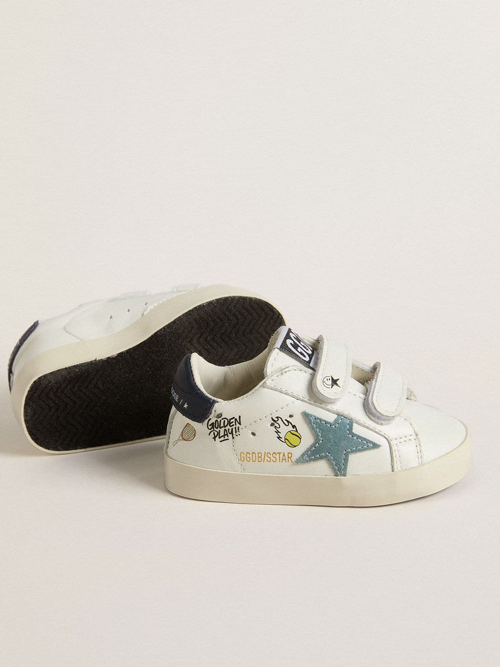 Baby School in white nappa with light blue suede star and tennis motif