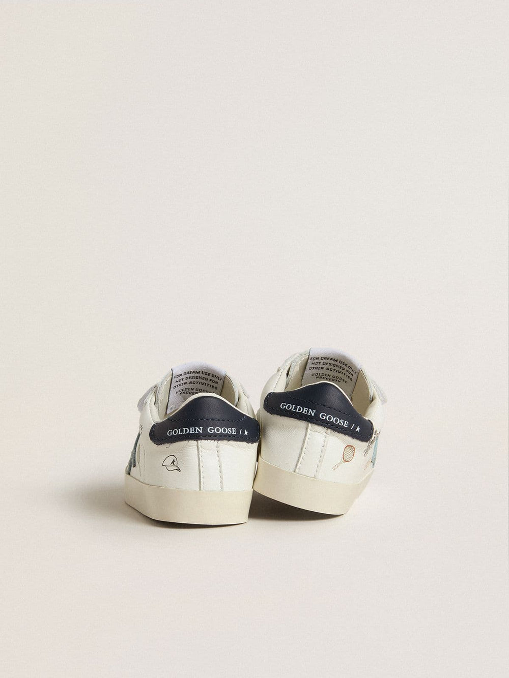 Baby School in white nappa with light blue suede star and tennis motif