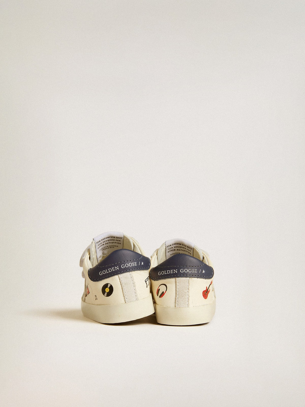 Baby School in nappa leather with musical print and white suede star